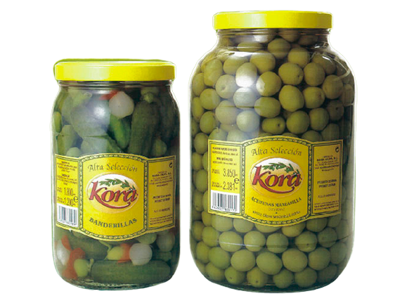 Kora Oliva Sevilla, a Sevillian company dedicated to the manufacture and packaging of olives and olives. Olives and olives packing machines, we export olives and olives. Manufacture and packaging of pickles